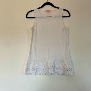 Lilly Pulitzer white tank top with eyelet hole design on the bottom seam